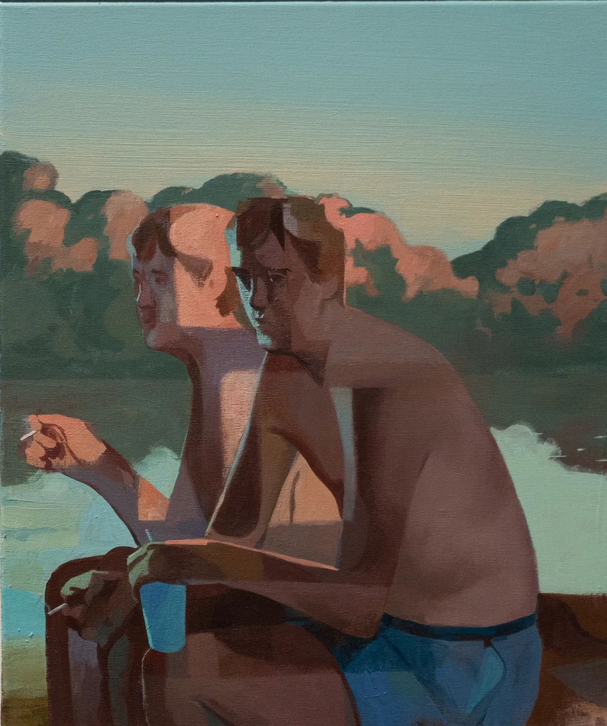 Full view: two young men by a river at dusk, their faces doubled as if caught mid-movement