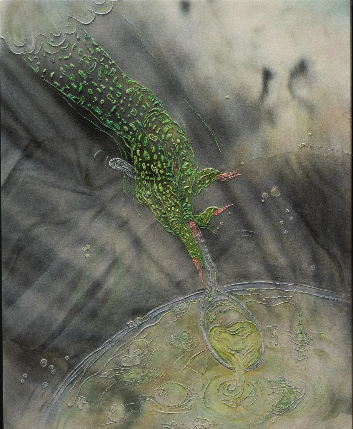 Full view: an embroidered green creature bending toward a pale pool on a dyed cotton sheet