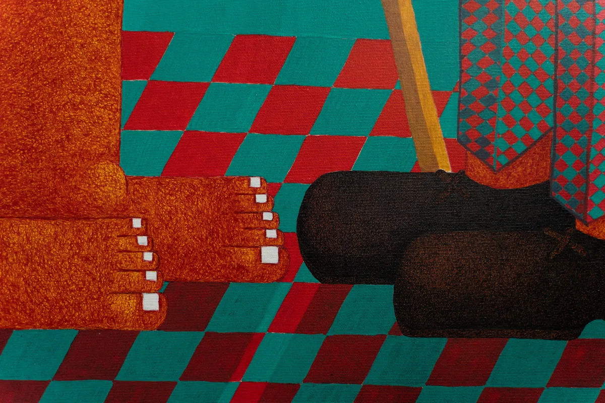 Detail of bare feet and a black cat on the checkerboard floor